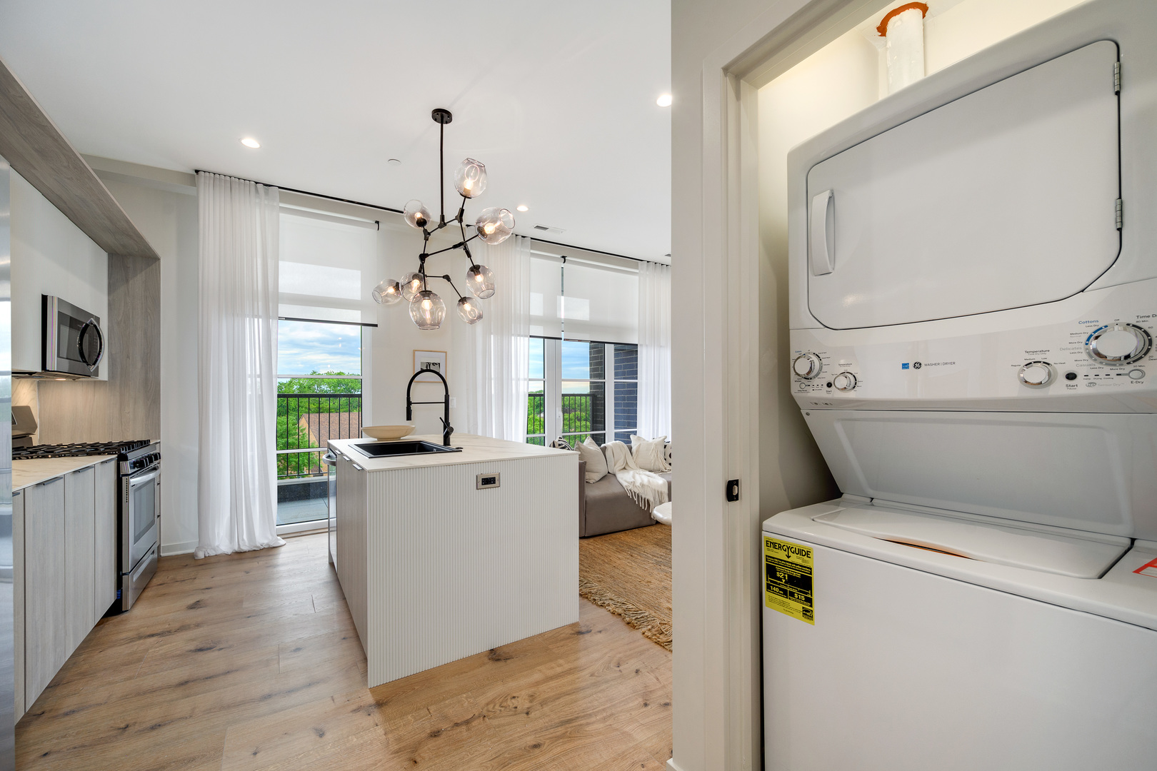 11 West Prospect Avenue, Unit 415 Mount Prospect, IL 60056 - Photo 15 of 62 a view of living room with furniture and a flat screen tv
