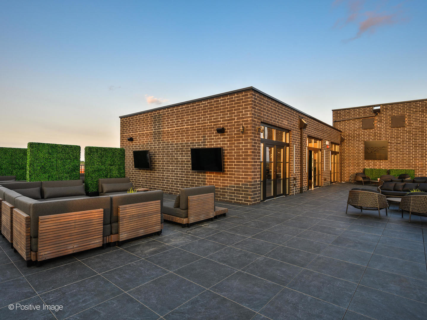 11 West Prospect Avenue, Unit 415 Mount Prospect, IL 60056 - Photo 48 of 62 a view of a couches and a fire pit in the patio