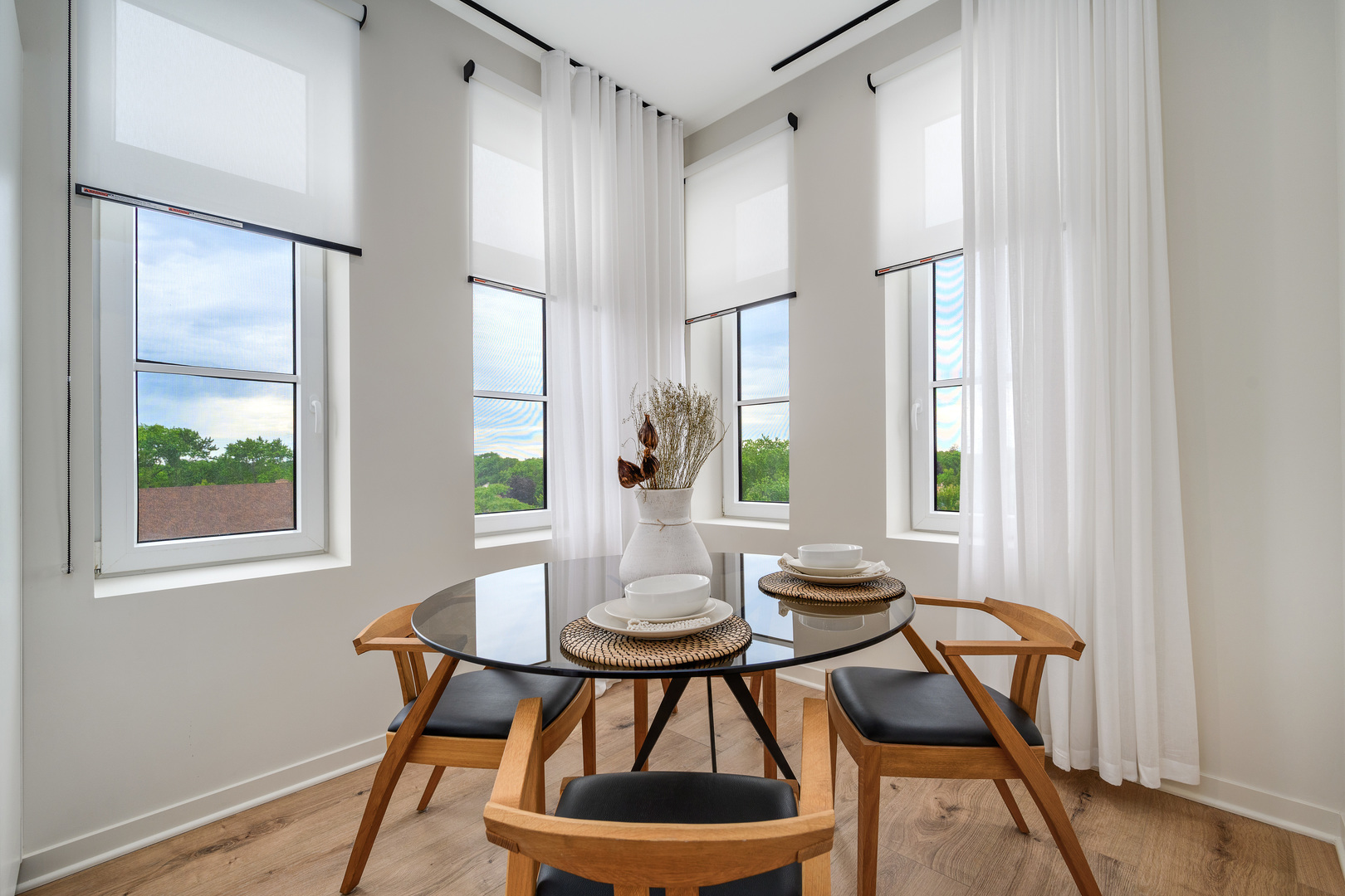 11 West Prospect Avenue, Unit 415 Mount Prospect, IL 60056 - Photo 10 of 62 a view of a dining room with furniture and window