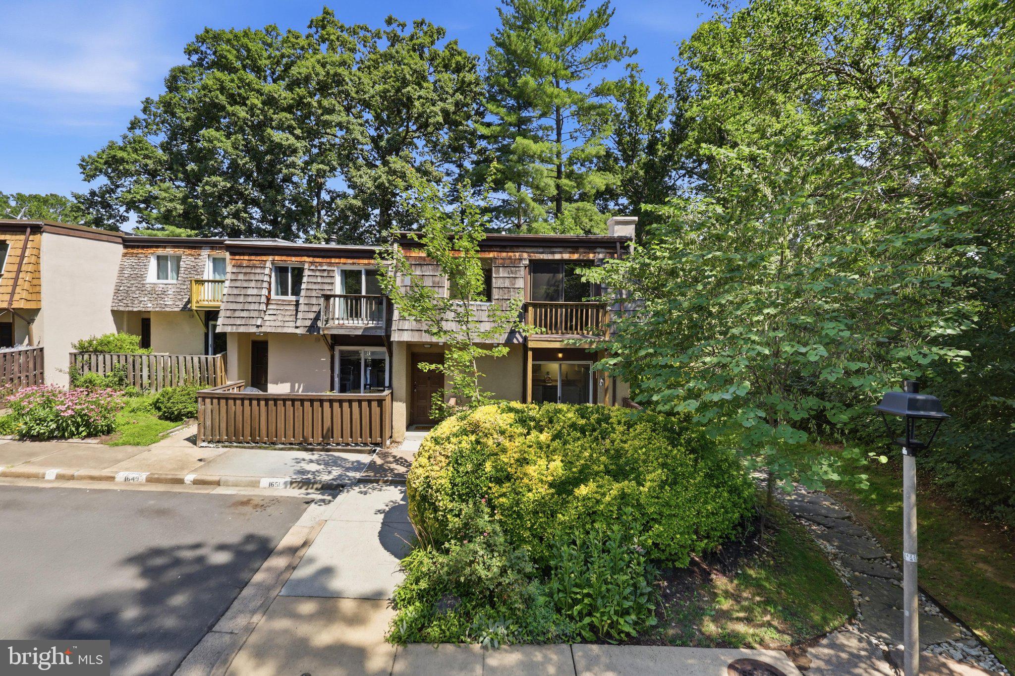 1651 Valencia Way Reston, VA 20190 - Photo 1 of 66 End-unit TH surrounded by green!