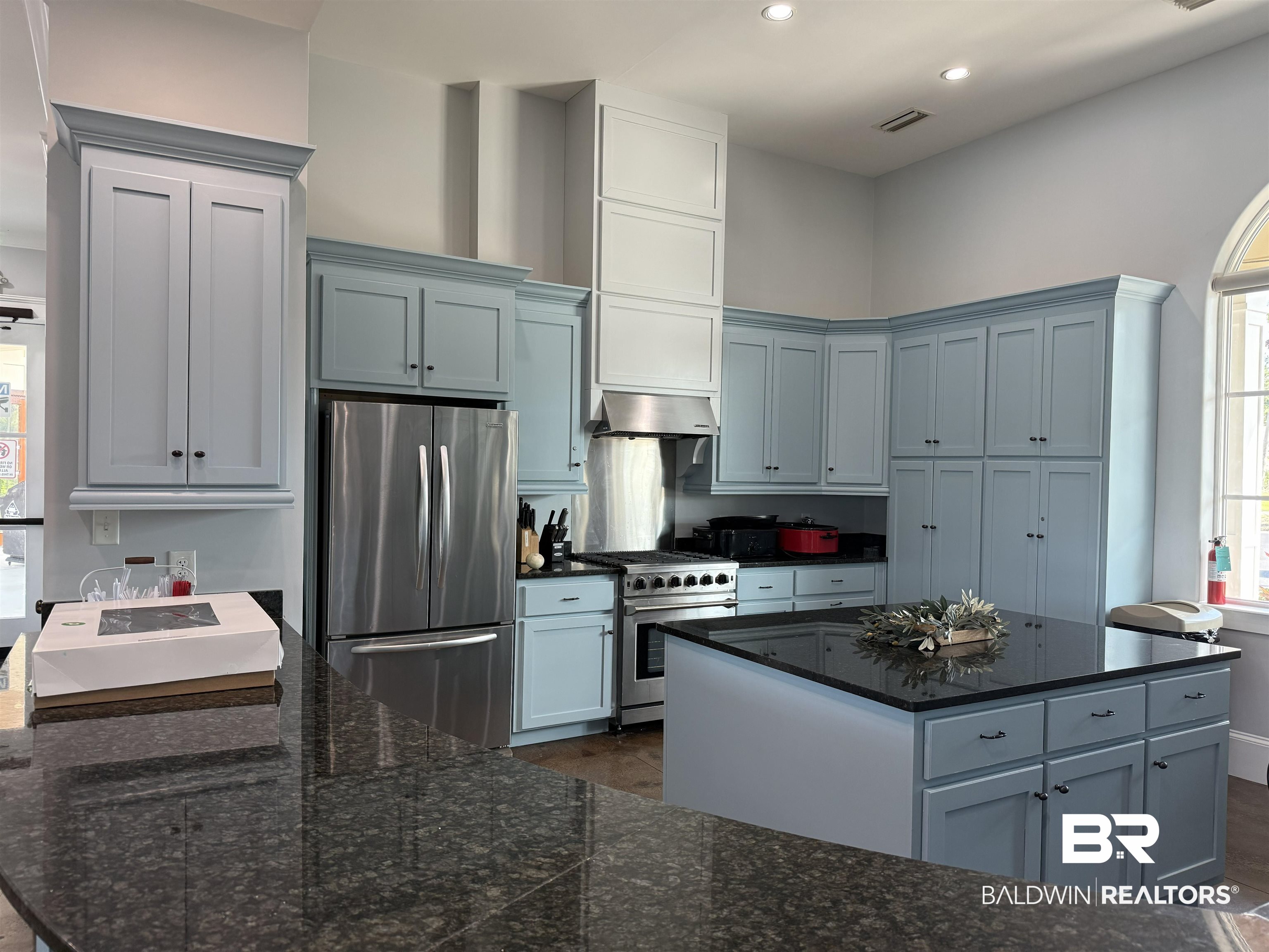 11986 Raptor Court Elberta, AL 36530 - Photo 15 of 28 Kitchen with stainless steel appliances, a kitchen island, recessed lighting, ventilation hood, and gray cabinets