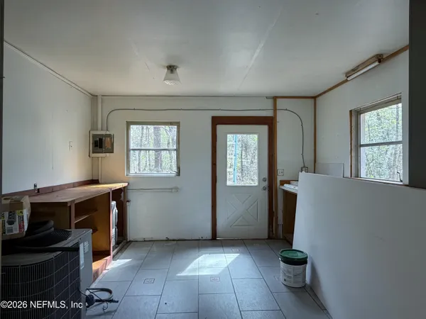 an empty room with windows
