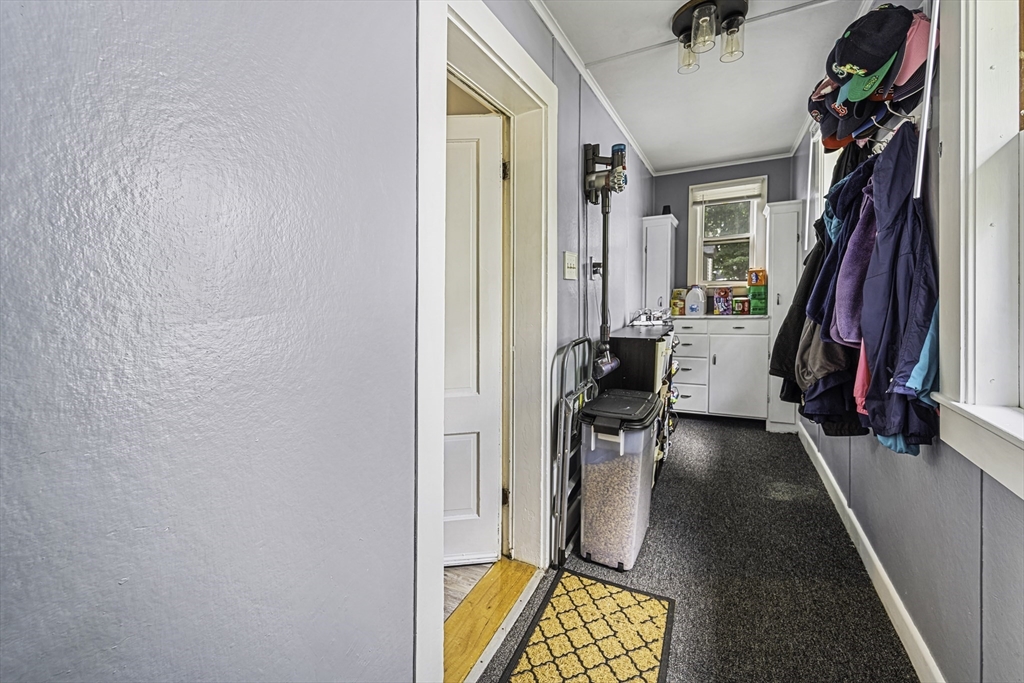 4 Collins Street Amesbury, MA 01913 - Photo 14 of 32 a view of walk in closet with clothes and shoes