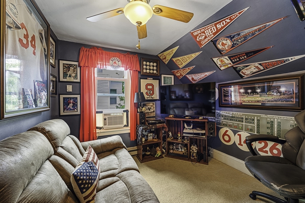 4 Collins Street Amesbury, MA 01913 - Photo 22 of 32 a living room with furniture and a large window