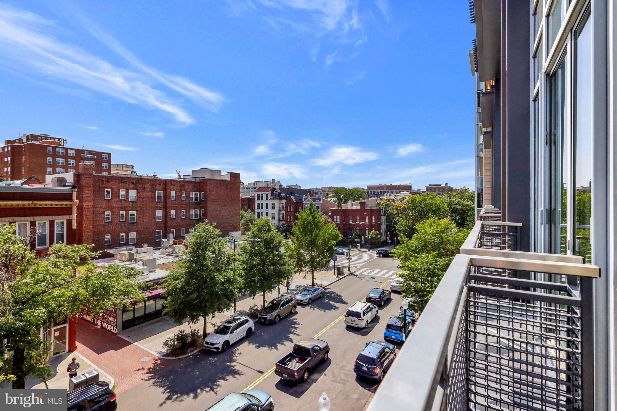 1515 15th Street Northwest, Unit 428 Washington, DC 20005 - Photo 11 of 30 Vibrant cityscape with sunny skies.