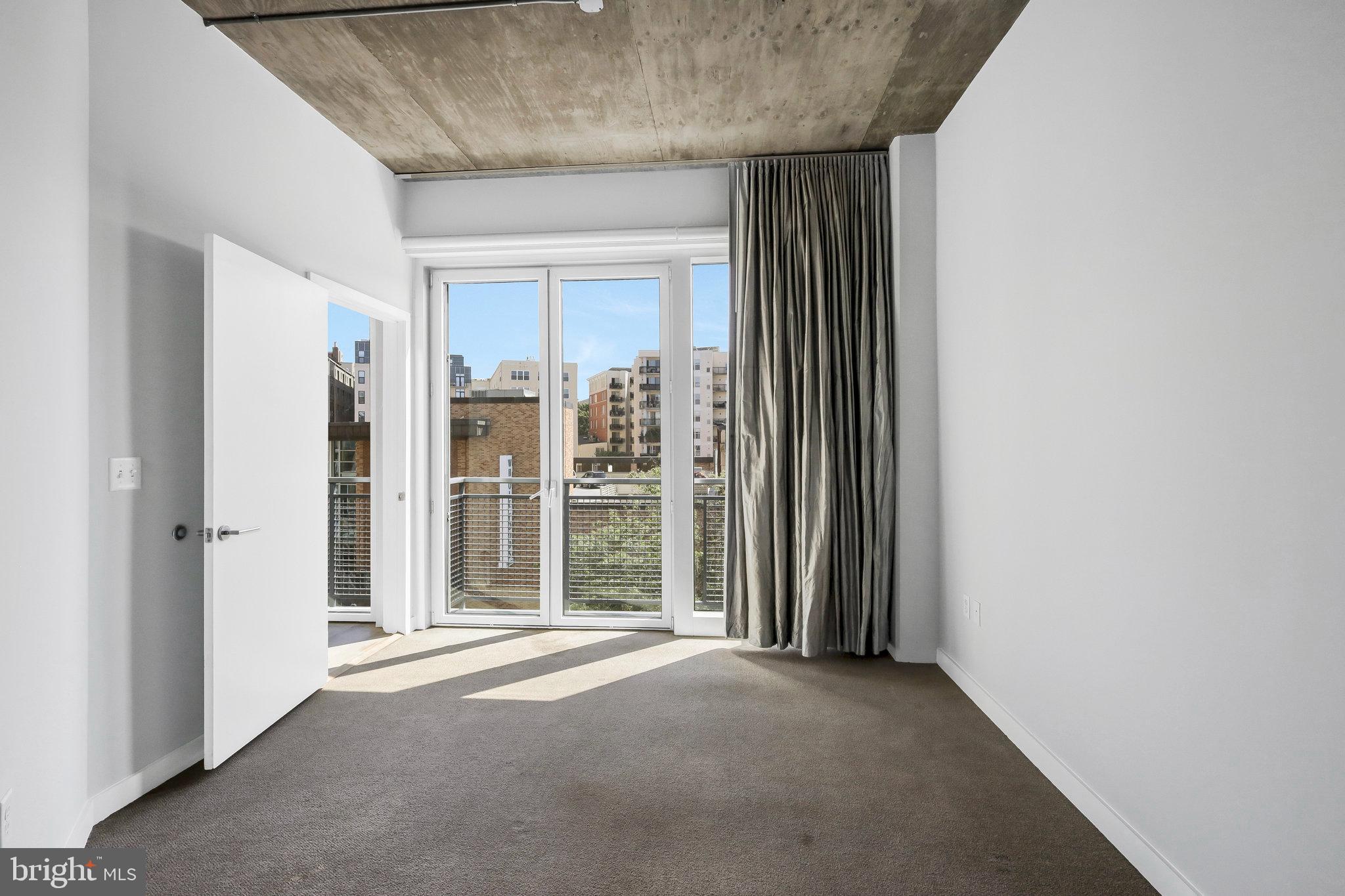 1515 15th Street Northwest, Unit 428 Washington, DC 20005 - Photo 13 of 30 Bright, airy space with urban views.