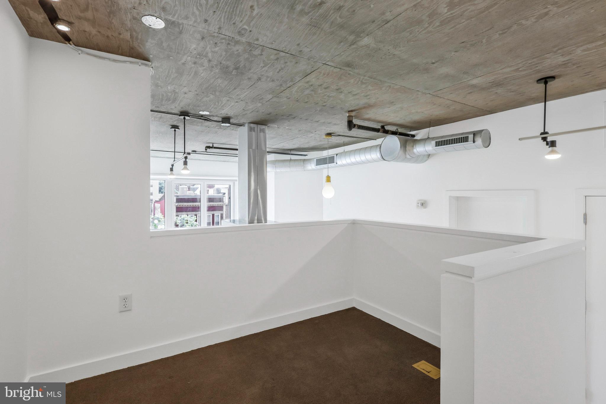 1515 15th Street Northwest, Unit 428 Washington, DC 20005 - Photo 20 of 30 Modern lofted Den with industrial charm.