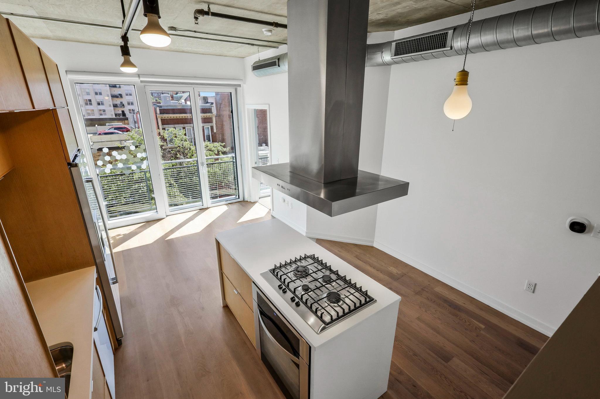 1515 15th Street Northwest, Unit 428 Washington, DC 20005 - Photo 21 of 30 Modern kitchen with bright, airy ambiance.