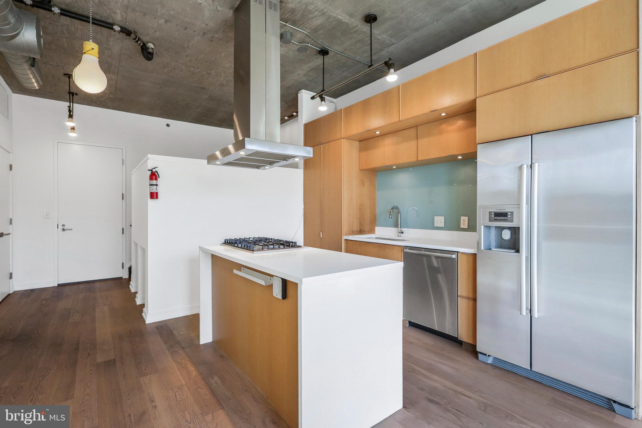 1515 15th Street Northwest, Unit 428 Washington, DC 20005 - Photo 5 of 30 Sleek modern kitchen with open layout.