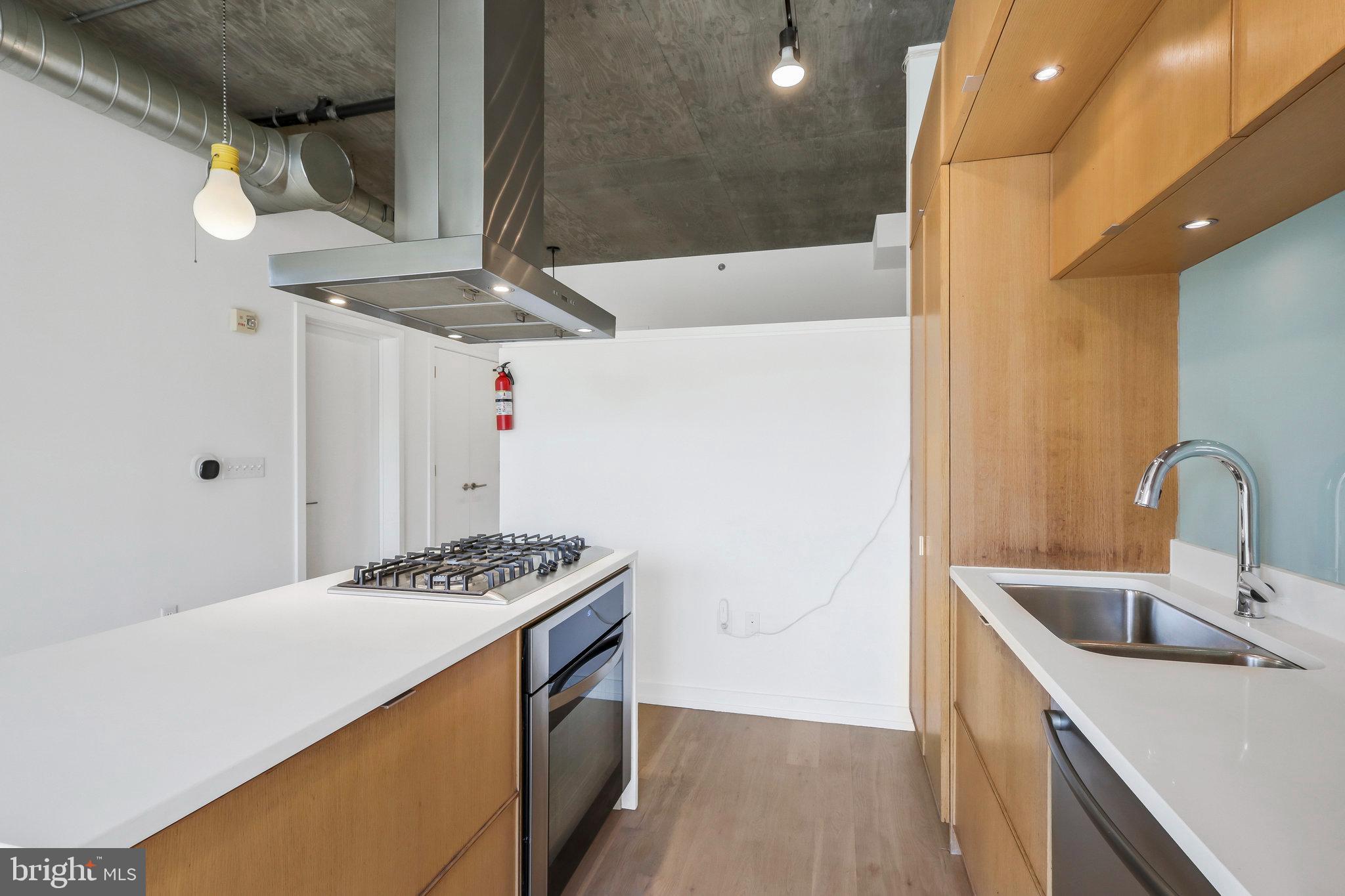 1515 15th Street Northwest, Unit 428 Washington, DC 20005 - Photo 6 of 30 Sleek modern kitchen with stylish finishes.