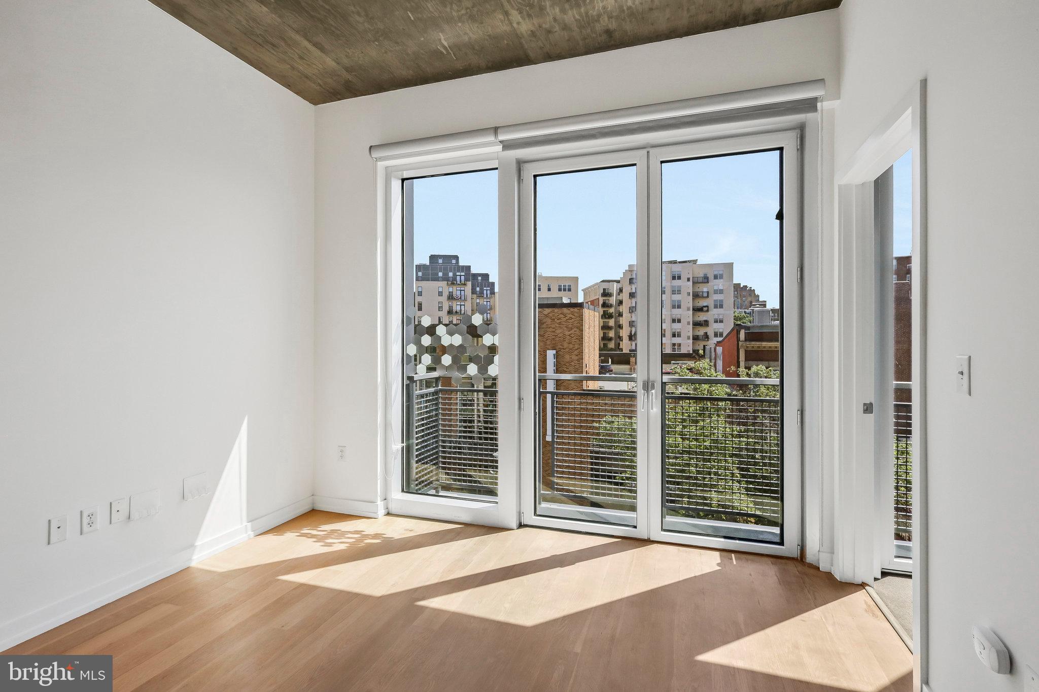 1515 15th Street Northwest, Unit 428 Washington, DC 20005 - Photo 8 of 30 Bright, airy space with urban views.