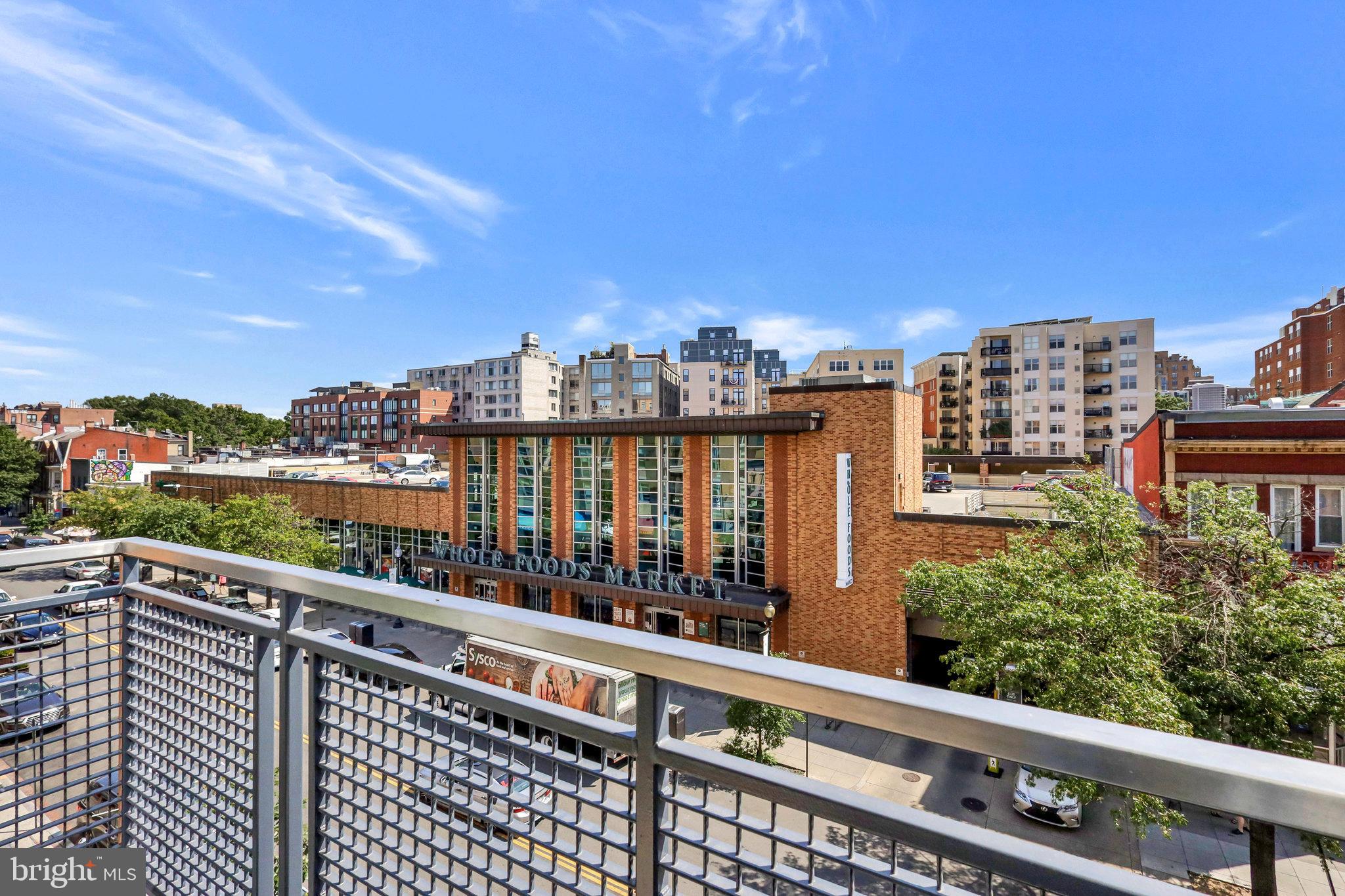 1515 15th Street Northwest, Unit 428 Washington, DC 20005 - Photo 10 of 30 Urban skyline with vibrant city life.