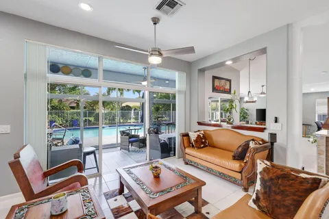 a bedroom with two beds and a dresser