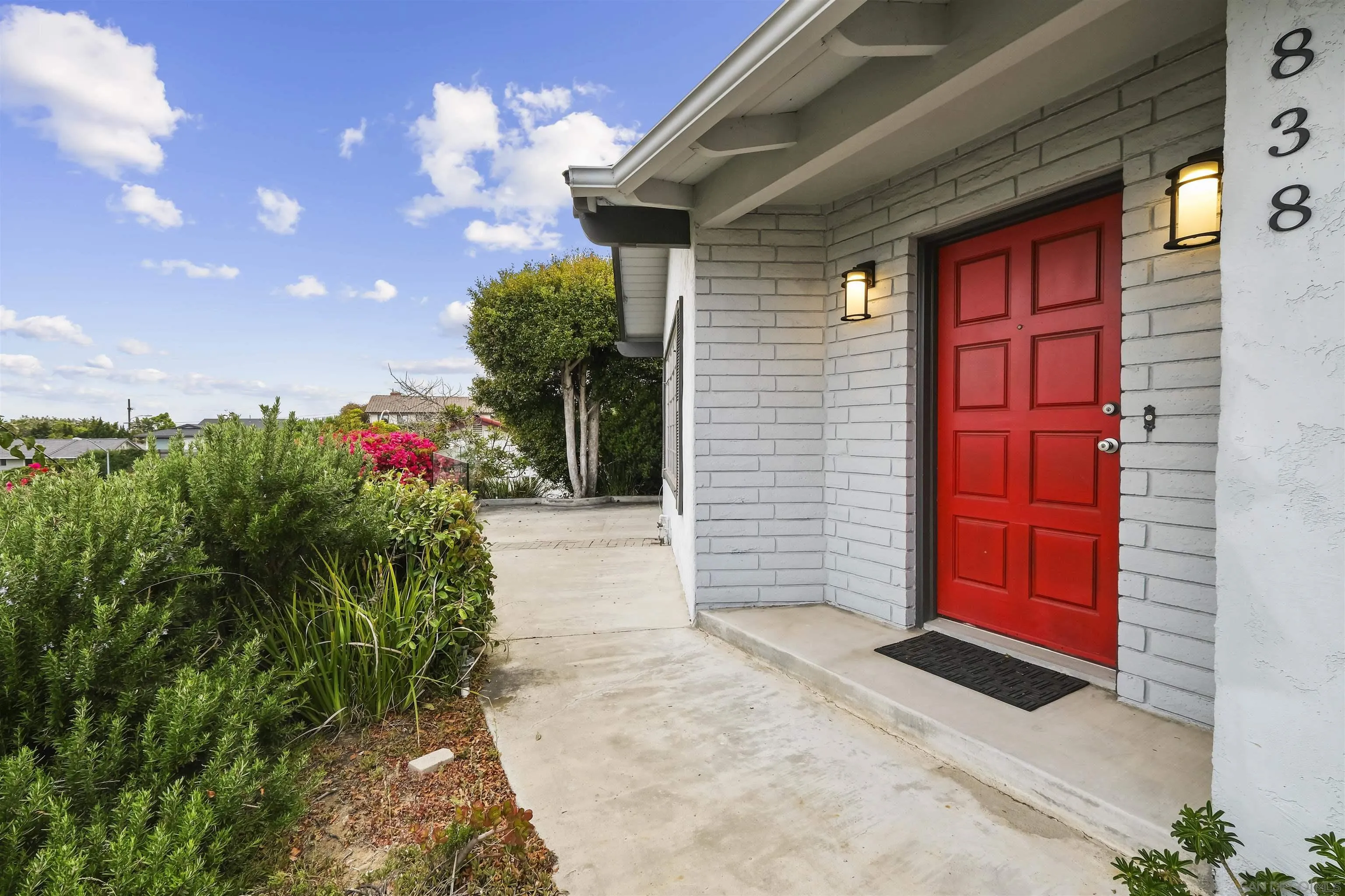 838 Lamplight Drive La Jolla, CA 92037 - Photo 37 of 42 a front view of a house with entryway