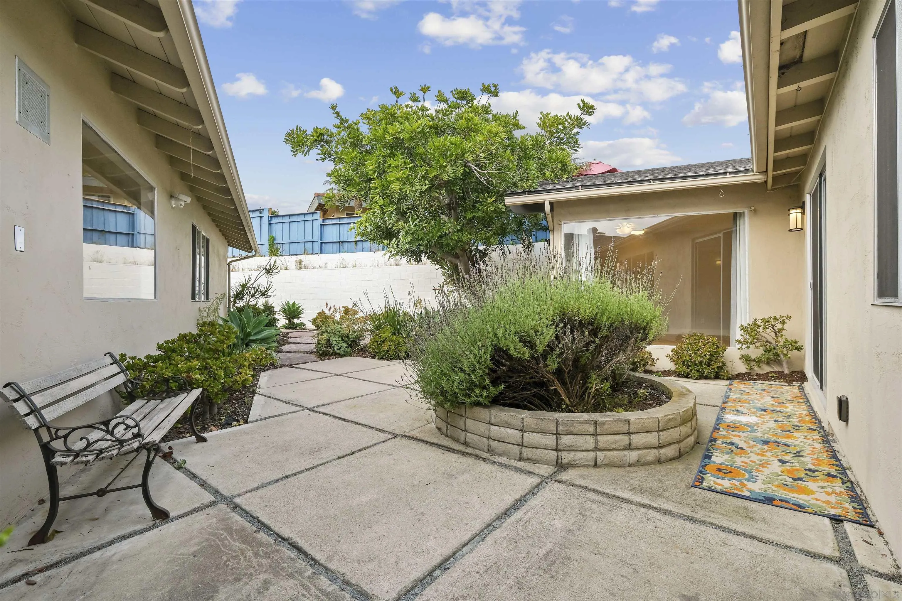 838 Lamplight Drive La Jolla, CA 92037 - Photo 4 of 42 a view of a house with a potted plant
