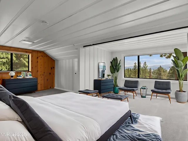 a view of storage and utility room with washer and dryer