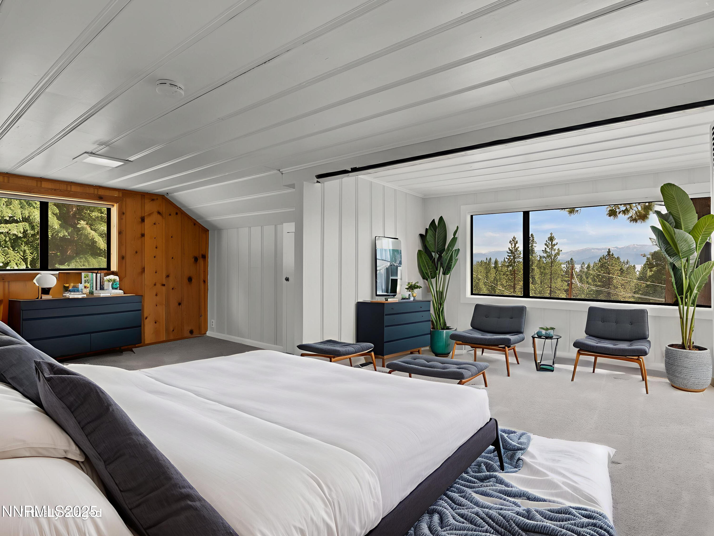 605 Jerry Drive Zephyr Cove, NV 89448 - Photo 18 of 61 a bedroom with a bed a large window and walk in closet