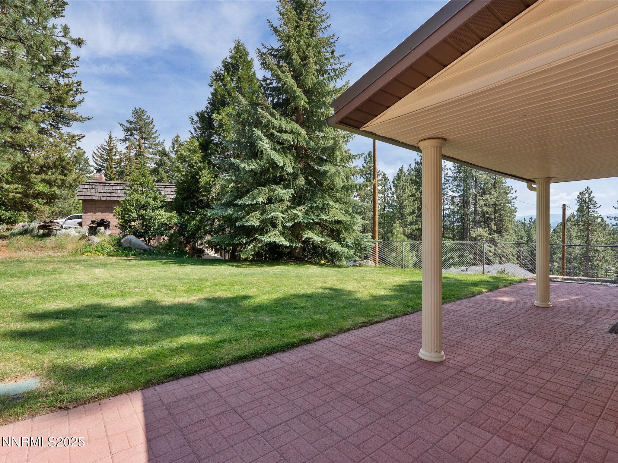 605 Jerry Drive Zephyr Cove, NV 89448 - Photo 26 of 61 a view of a house with a backyard