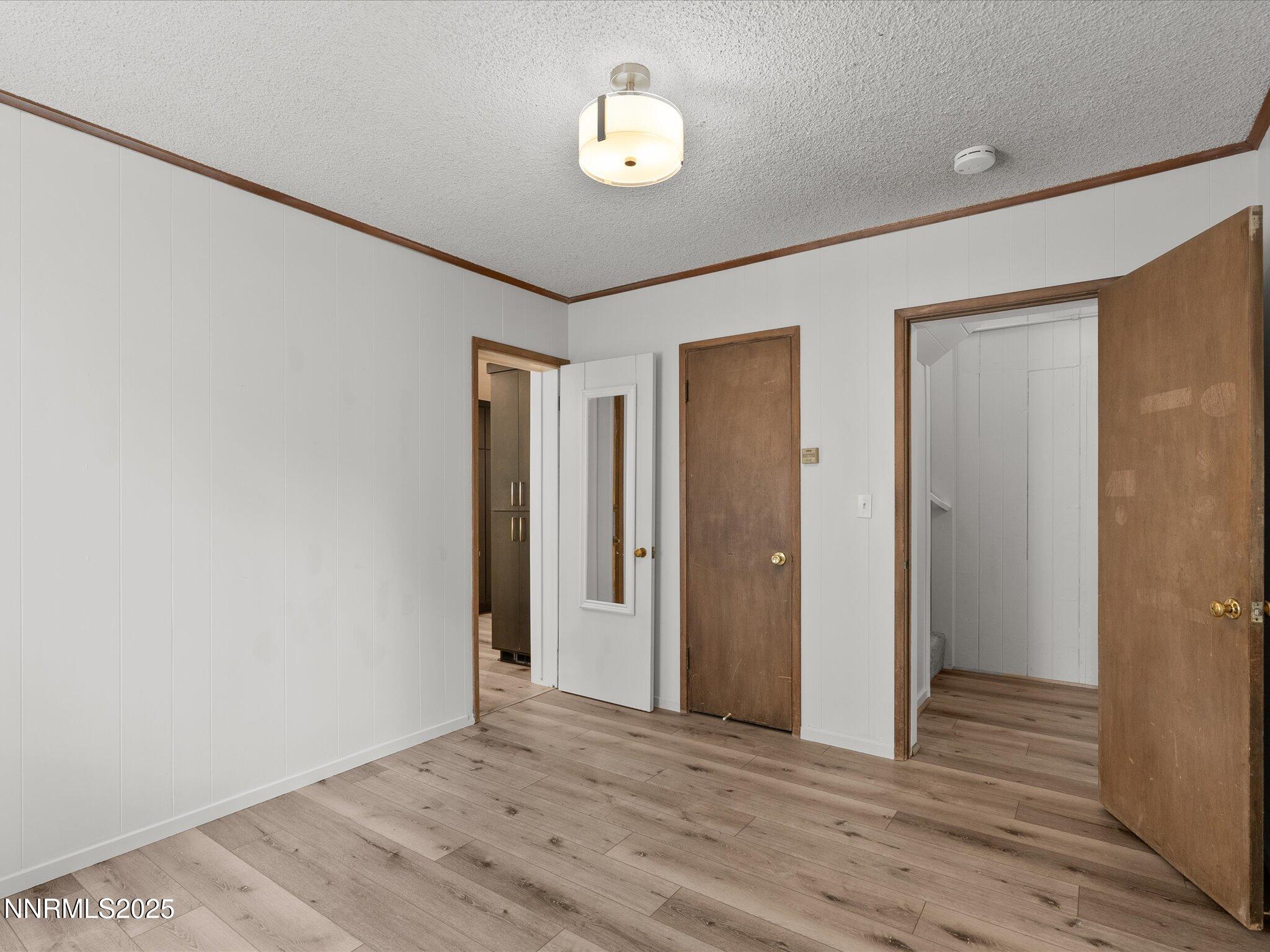 605 Jerry Drive Zephyr Cove, NV 89448 - Photo 30 of 61 a view of an empty room with wooden floor