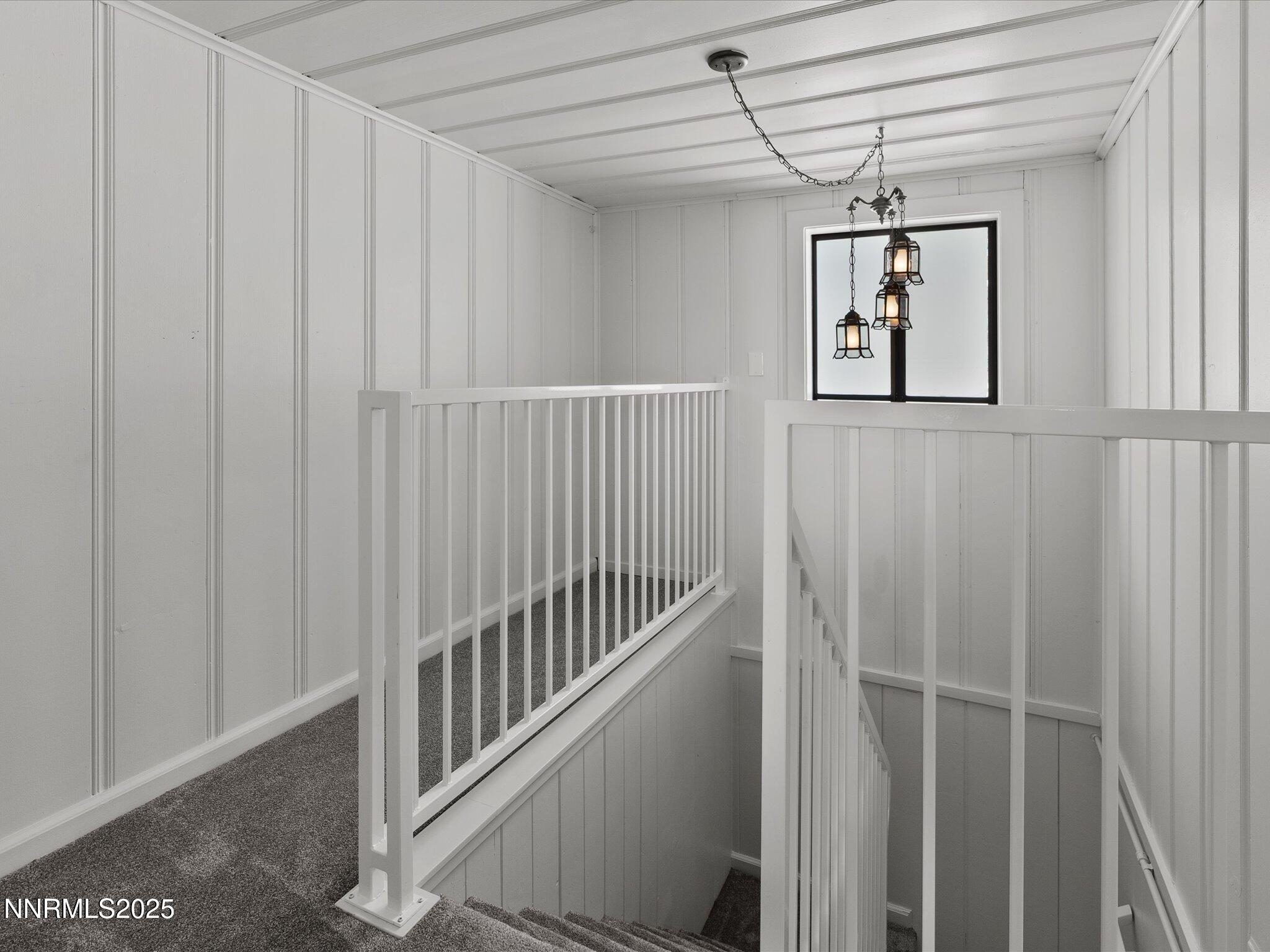 605 Jerry Drive Zephyr Cove, NV 89448 - Photo 32 of 61 a view of a hallway with windows