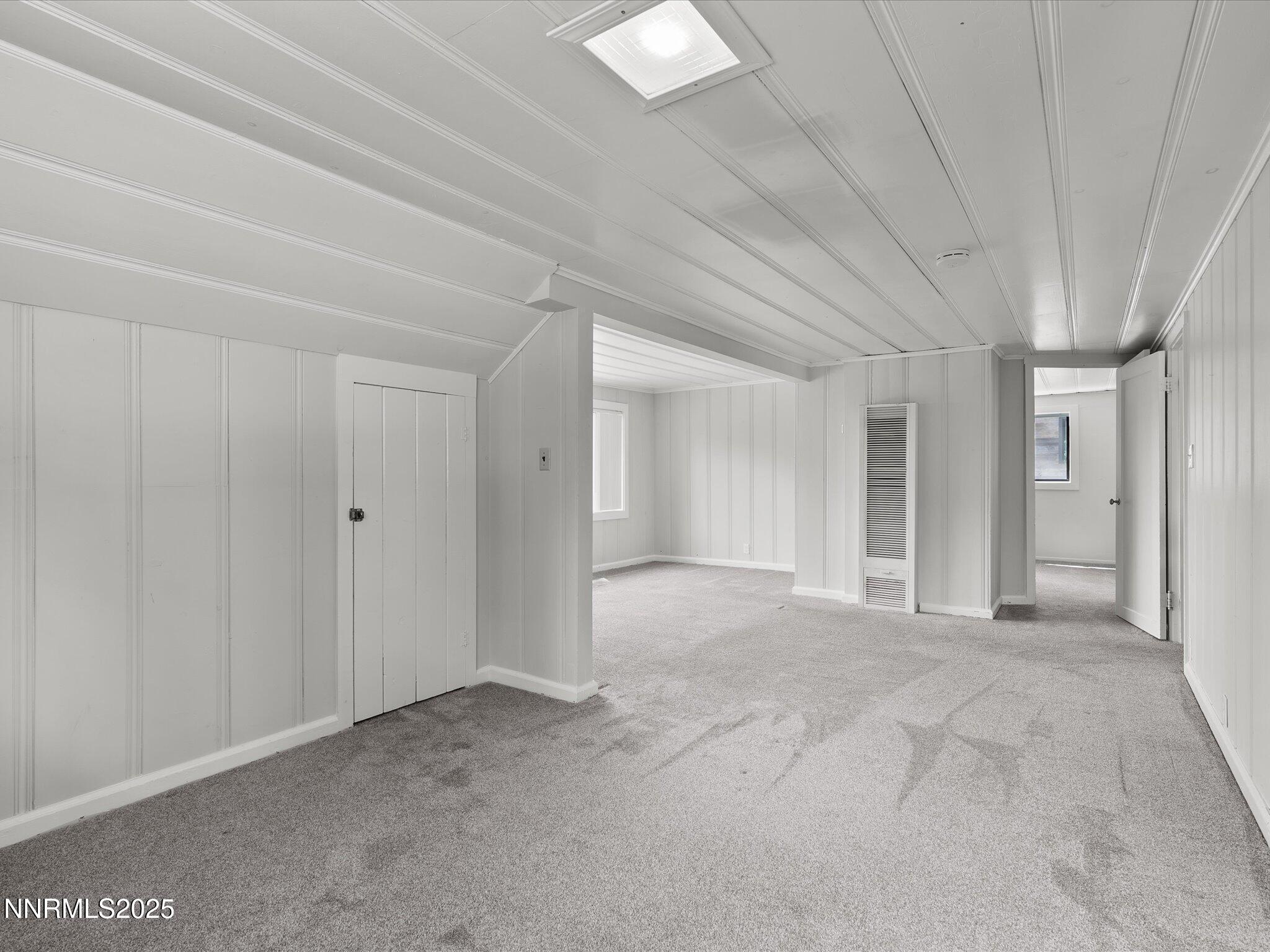 605 Jerry Drive Zephyr Cove, NV 89448 - Photo 33 of 61 a view of a big room with closet and windows