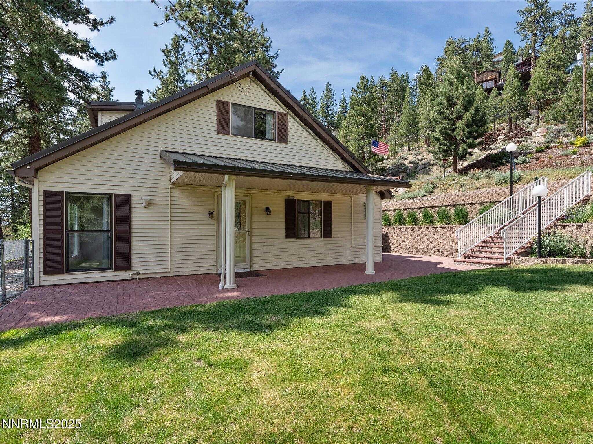605 Jerry Drive Zephyr Cove, NV 89448 - Photo 4 of 61 a view of a house with a yard