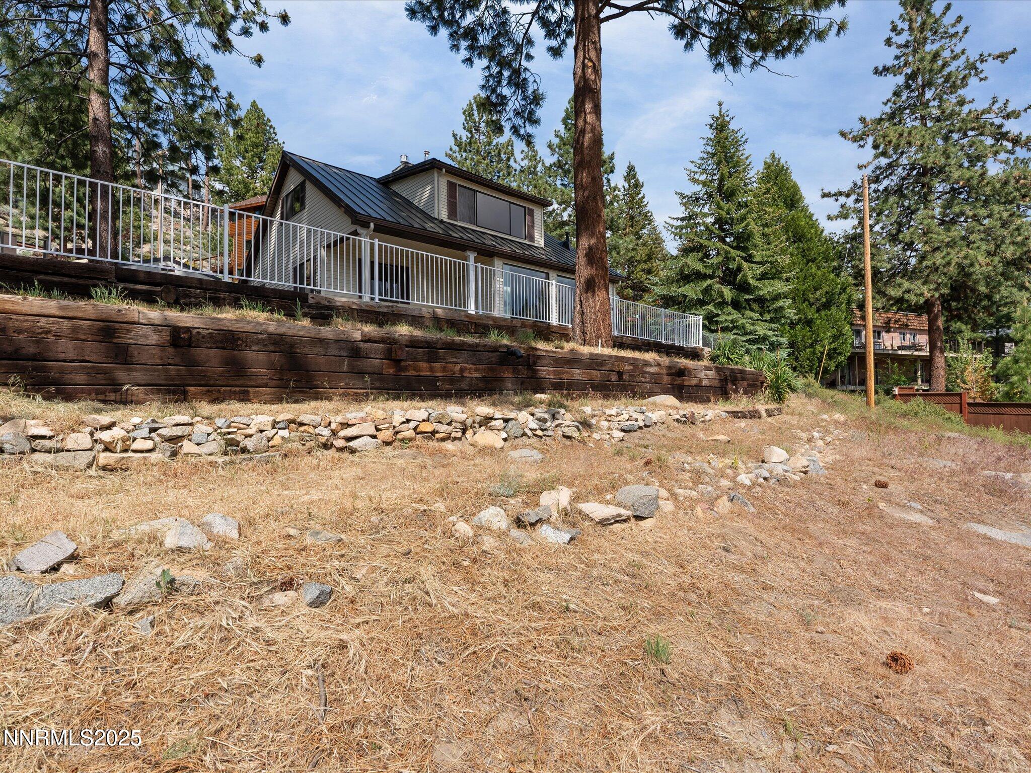 605 Jerry Drive Zephyr Cove, NV 89448 - Photo 41 of 61 a view of a house with a yard covered in snow