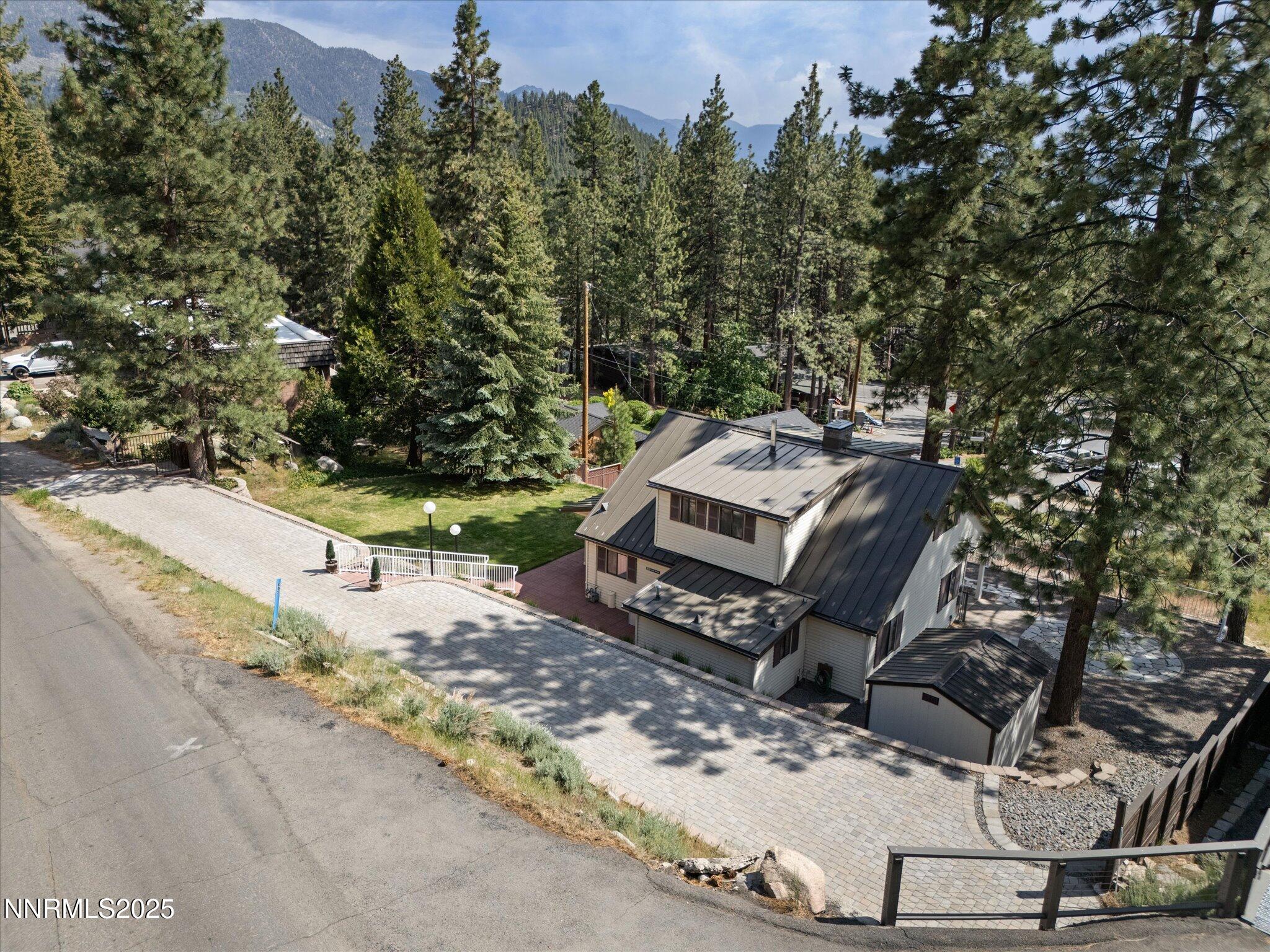 605 Jerry Drive Zephyr Cove, NV 89448 - Photo 47 of 61 a view of a backyard with chairs
