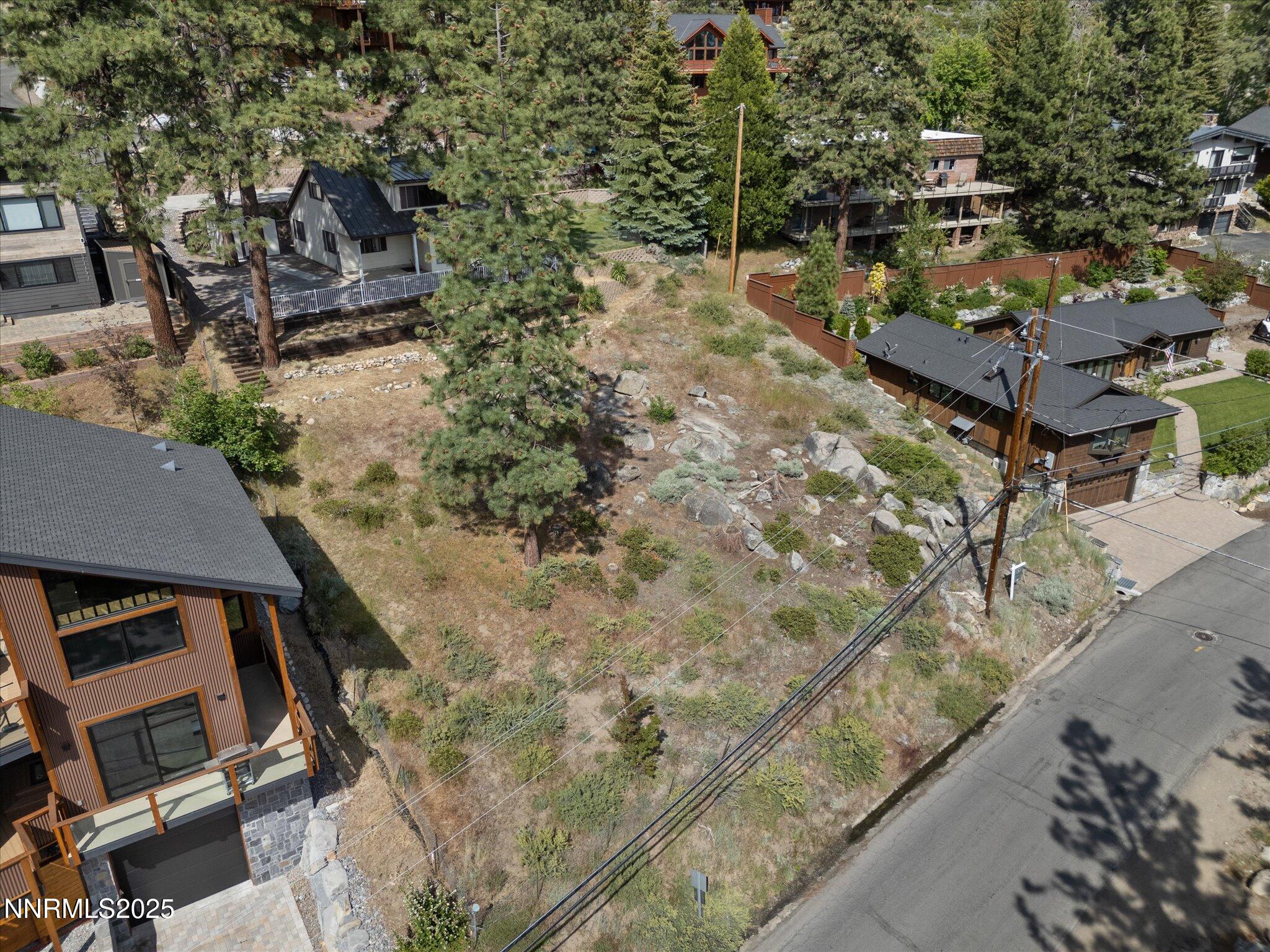 605 Jerry Drive Zephyr Cove, NV 89448 - Photo 55 of 61 an aerial view of a house with a yard