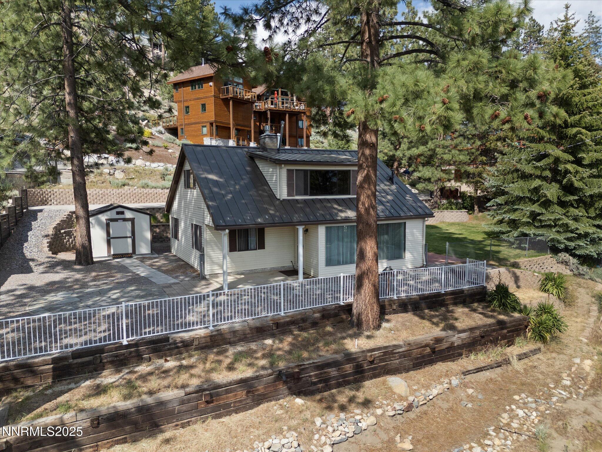 605 Jerry Drive Zephyr Cove, NV 89448 - Photo 7 of 61 a front view of a house with garden