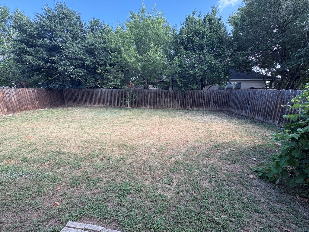 1367 Lakeside Loop Round Rock, TX 78665 - Photo 18 of 19 View of fenced backyard