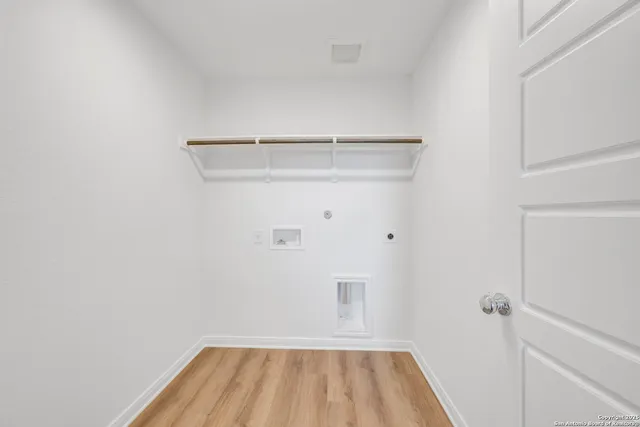 a view of small space with racks on the wall