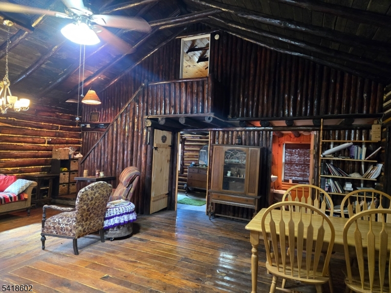 40 Meyer Road Branchville, NJ 07827 - Photo 3 of 11 a building outdoor space with patio furniture and wooden floor