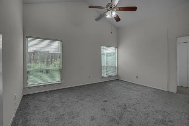 an empty room with windows