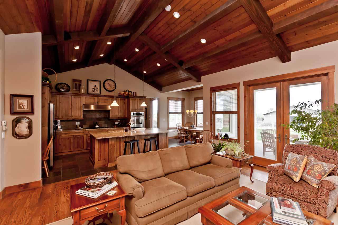 1355 Saddle Ridge Road Loma, CO 81524 - Photo 18 of 36 a living room with furniture a large window with kitchen view