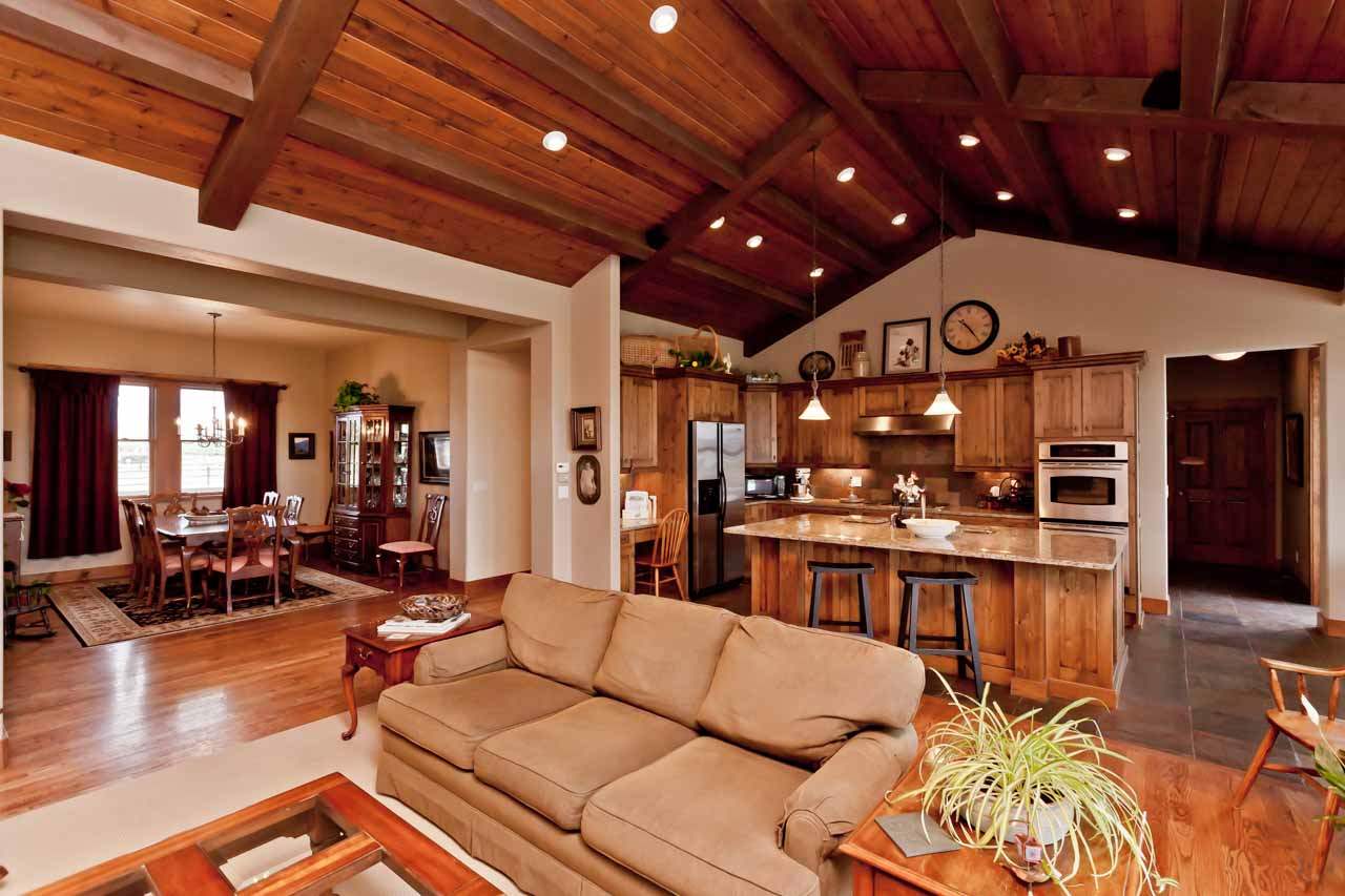1355 Saddle Ridge Road Loma, CO 81524 - Photo 21 of 36 a living room with lots of furniture and chandelier