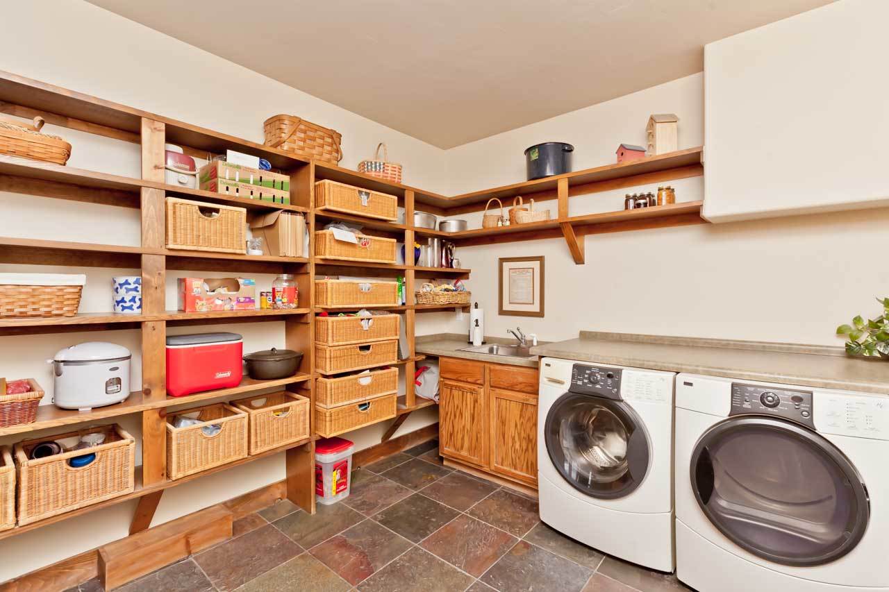 1355 Saddle Ridge Road Loma, CO 81524 - Photo 25 of 36 a utility room with dryer and washer