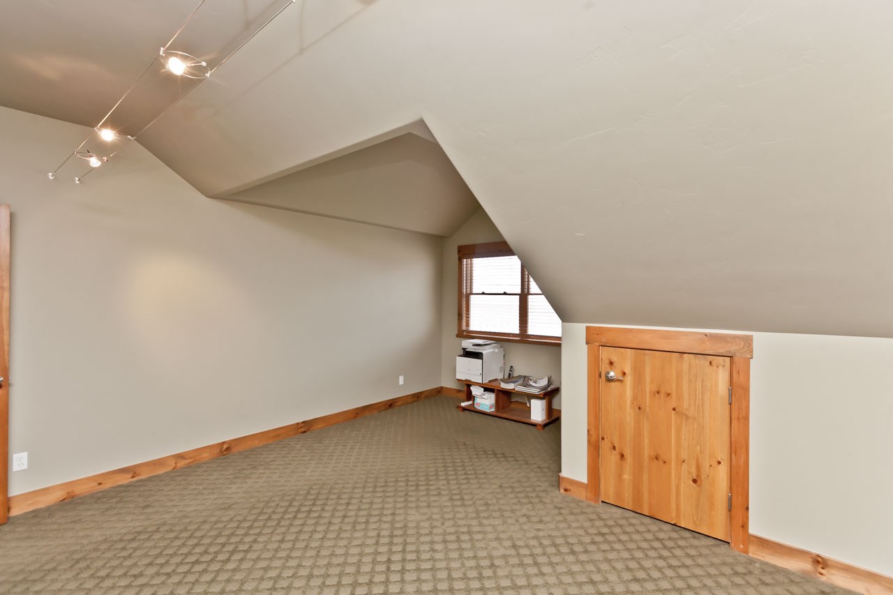 1355 Saddle Ridge Road Loma, CO 81524 - Photo 29 of 36 a view of storage and utility room with a window