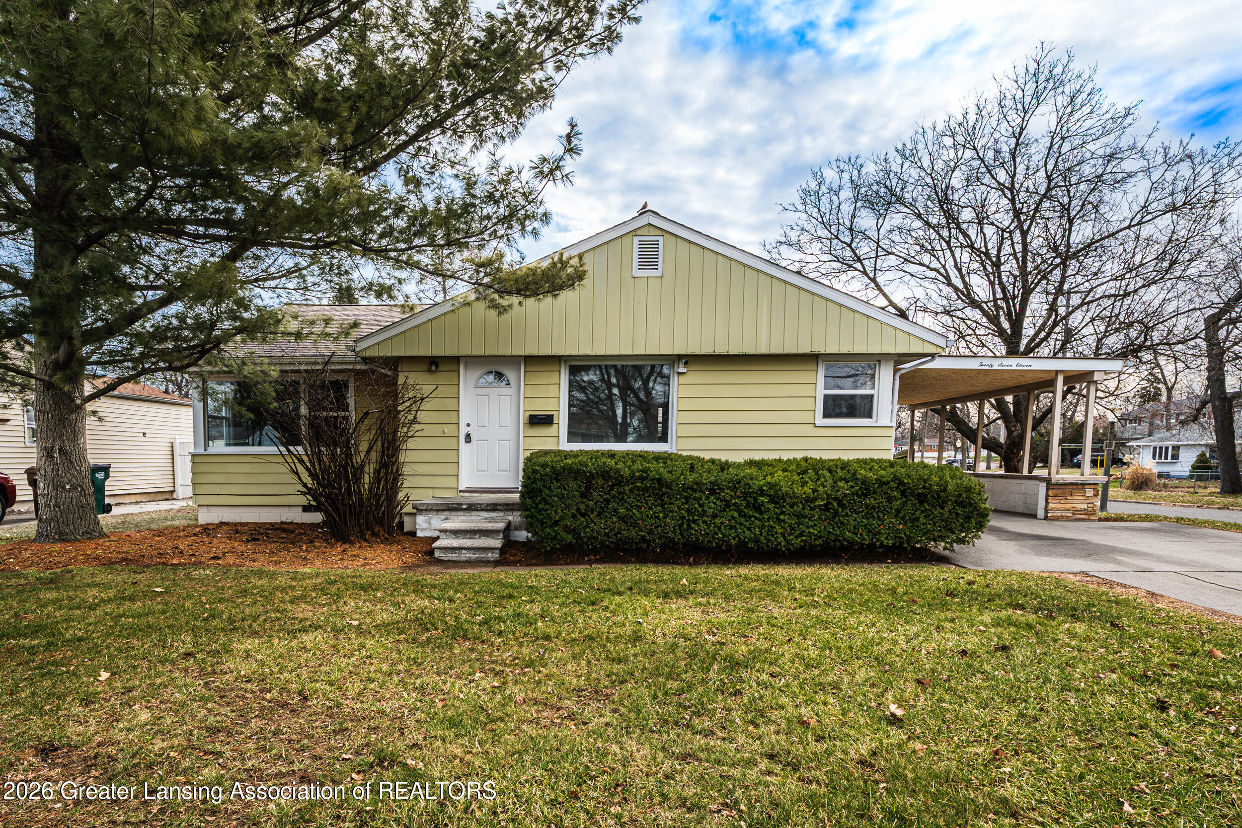 2711 Pleasant Grove Road Lansing, MI 48910 - Photo 1 of 31 Front