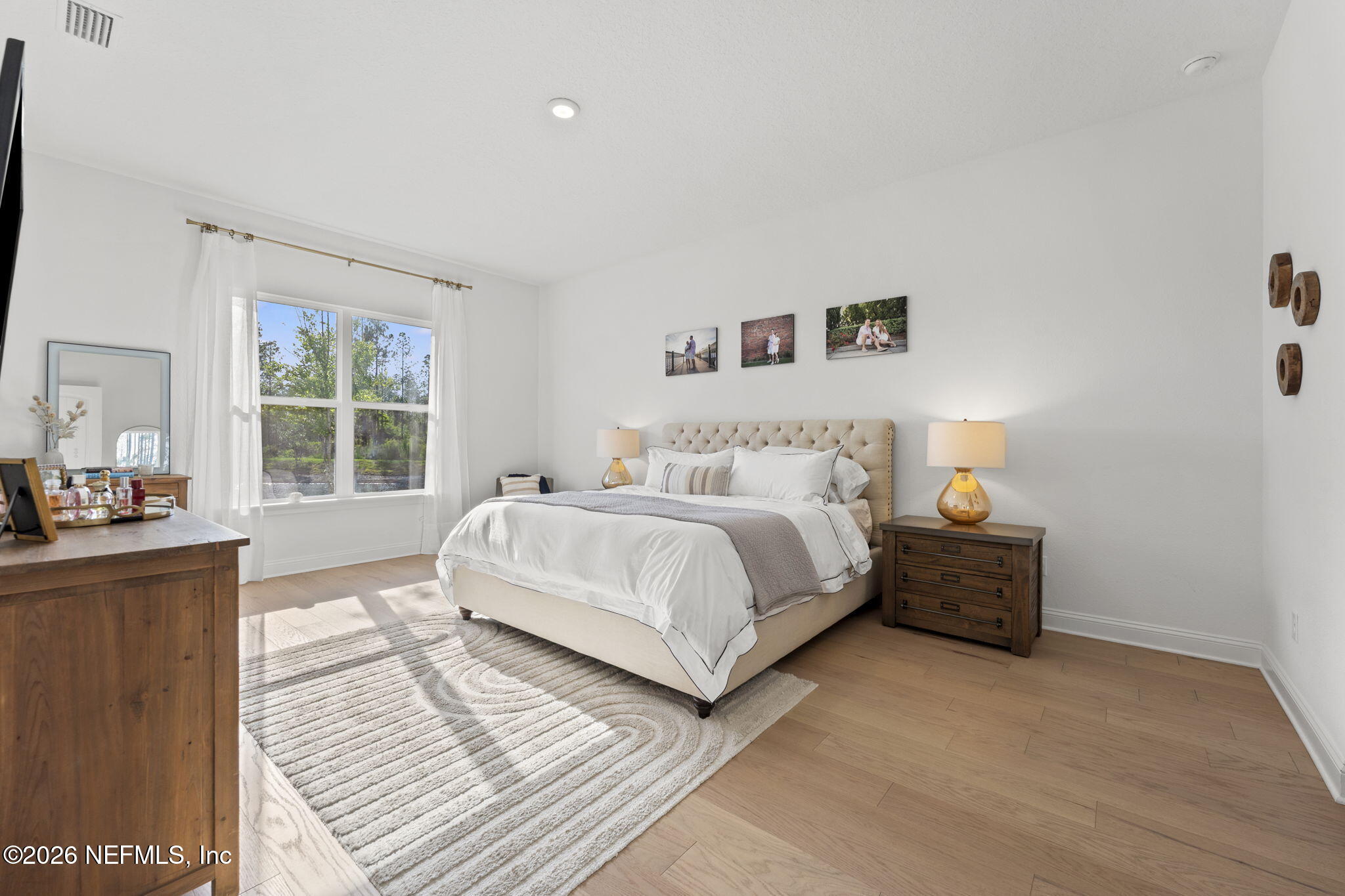 101 Elm Br Road St. Johns, FL 32259 - Photo 27 of 77 a bedroom with a large bed and a window