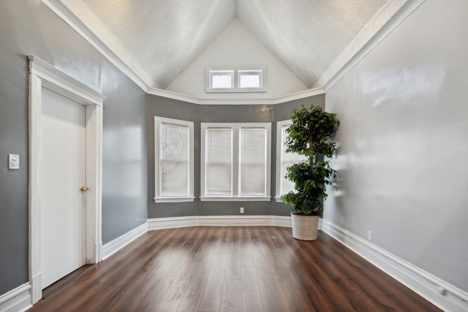 5918 South Carpenter Street Chicago, IL 60621 - Photo 9 of 15 wooden floor in an empty room with a window