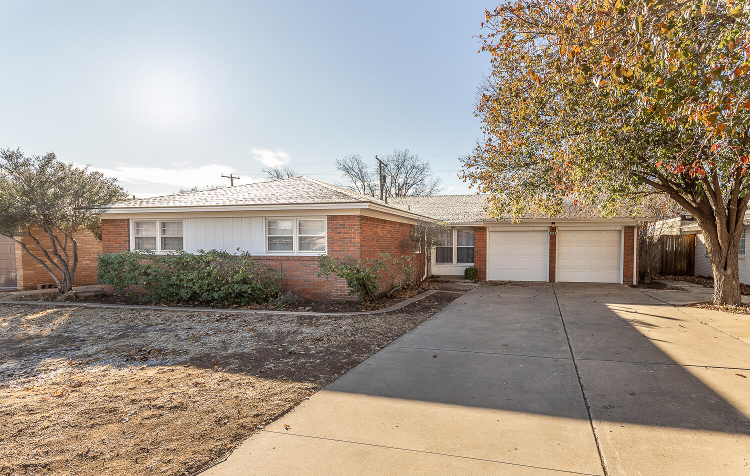 3613 58th Street Lubbock, TX 79413 - Photo 19 of 20 a view of a house with a yard