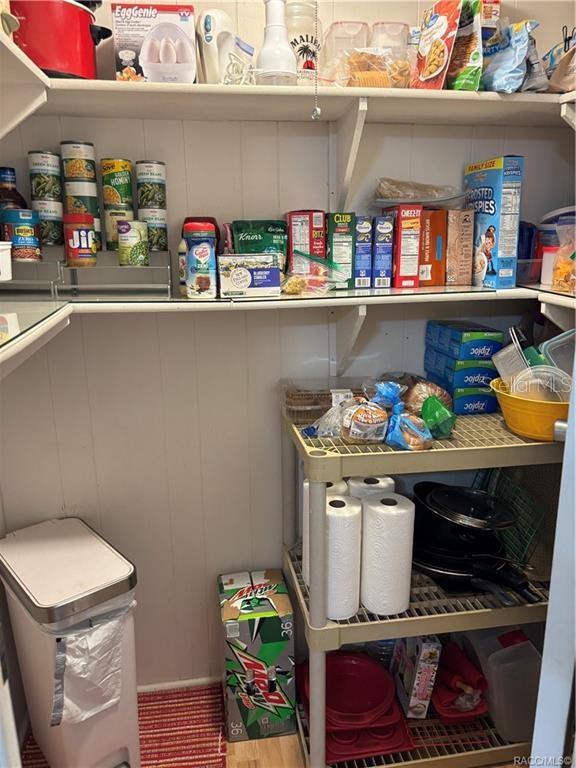 14334 Midfield Street Brooksville, FL 34613 - Photo 11 of 48 a room with storage and utility