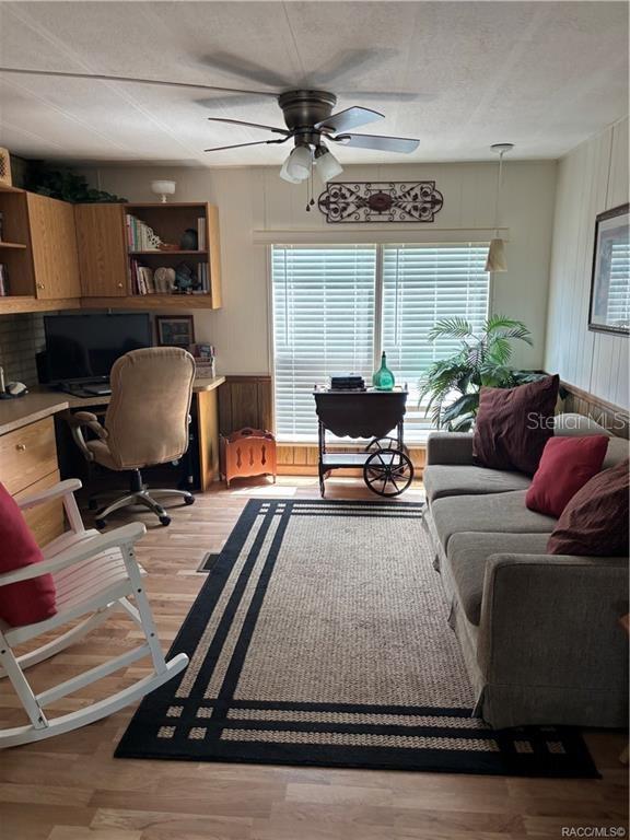 14334 Midfield Street Brooksville, FL 34613 - Photo 20 of 48 a living room with furniture