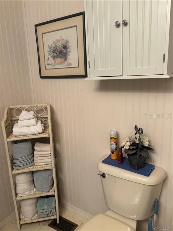 14334 Midfield Street Brooksville, FL 34613 - Photo 37 of 48 a bathroom with a toilet