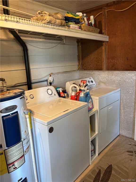 14334 Midfield Street Brooksville, FL 34613 - Photo 44 of 48 a utility room with dryer and washer