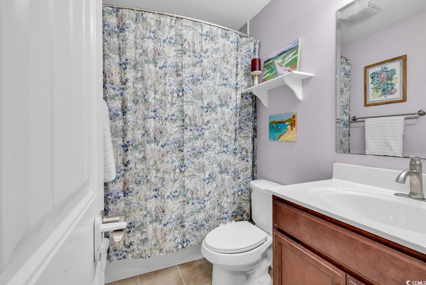 160 Cloey Road Myrtle Beach, SC 29579 - Photo 7 of 38 Bathroom featuring tile patterned flooring, curtai