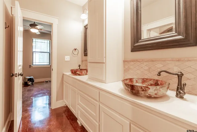 a bathroom with a shower and a toilet