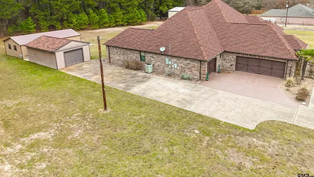 a house view with a backyard space