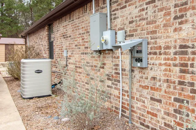a bathroom with a shower and a sink